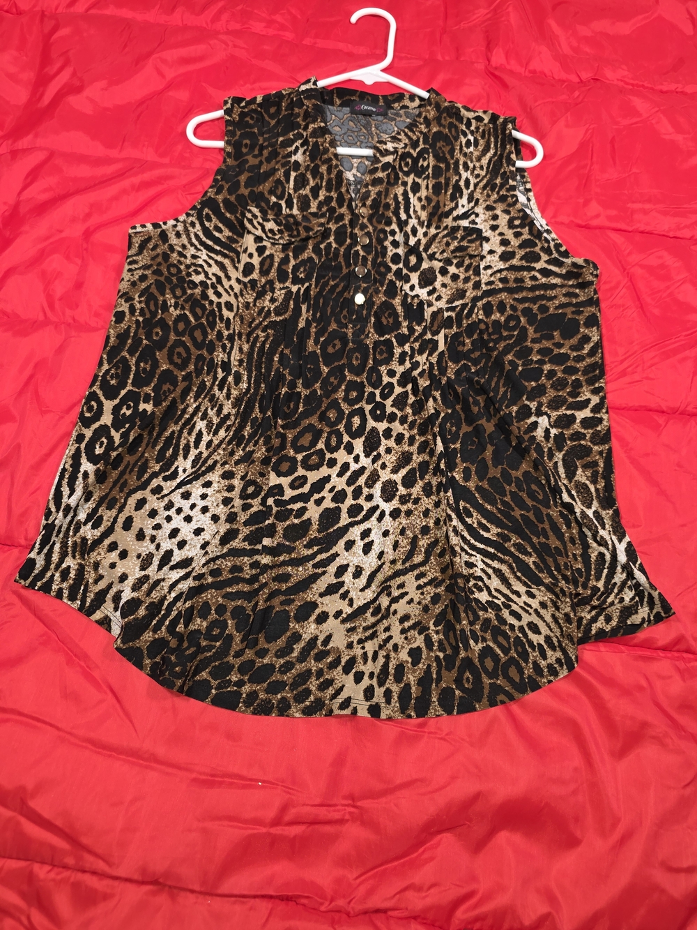 Cocomo Leopard Print Sleeveless Blouse in Brown and Black